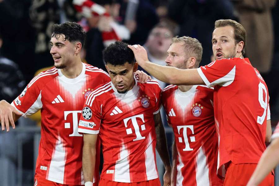 Bayern Munich's Luis Diaz is congatulated after scoring