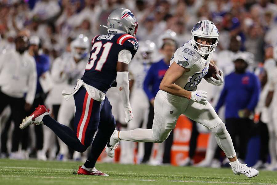 Buffalo Bills' Dalton Kincaid (right) goes up against New England Patriots Craig Woodson (left) during Week 5 of 2025 season Buffalo Bills' Dalton Kincaid (right) goes up against New England Patriots Craig Woodson (left) during Week 5 of 2025 season