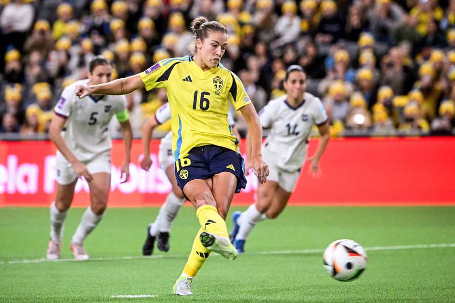 Sweden's Filippa Angeldahl scores their first goal from the penalty spot