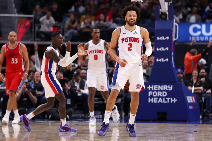 Pistons guard Cade Cunningham celebrating after a three-point against the Los Angeles Clippers
