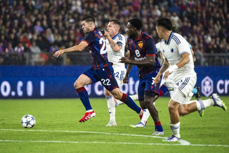 Basel's Leo Leroy, left, fights for the ball ball with FC Copenhagen's Lukas Lerager