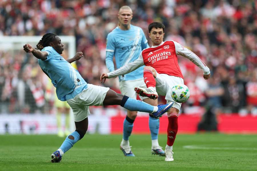 Manchester City's Jeremy Doku in action with Arsenal's Martin Zubimendi (right) Manchester City's Jeremy Doku in action with Arsenal's Martin Zubimendi (right)