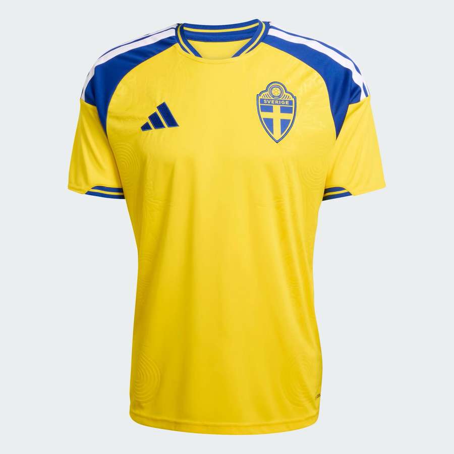Die drei weißen Adidas-Streifen auf der Schulter sind eine Addition zu dem gewohnt Gelb-blauen Muster