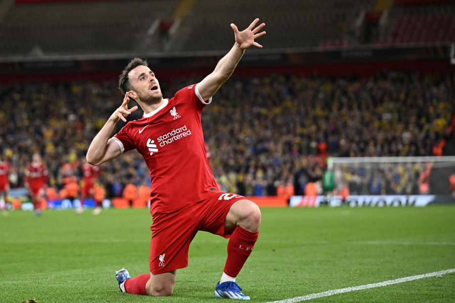 Diogo Jota celebrates scoring Liverpool's second goal in the 92nd minute