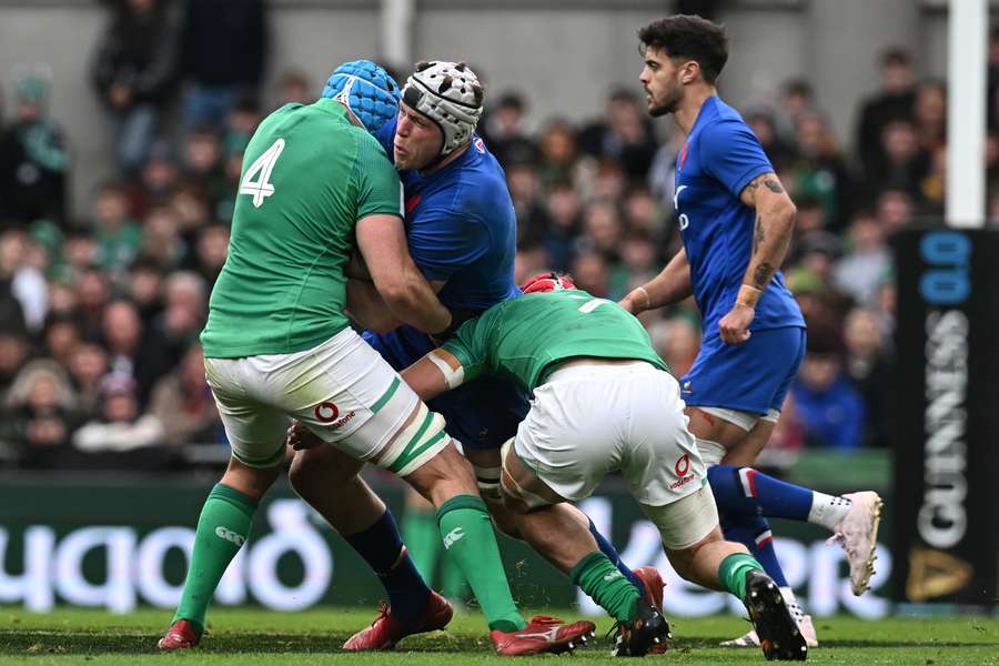 France's lock Thibaud Flament is tackled during the Six Nations international rugby union match between Ireland and France 
