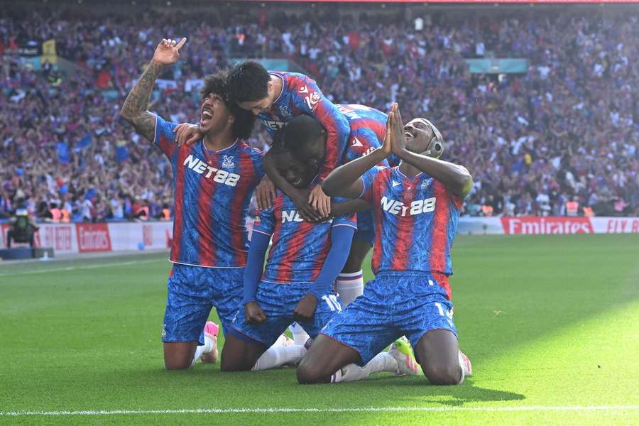 Crystal Palace's players celebrate Eze's (bottom middle) goal Crystal Palace's players celebrate Eze's (bottom middle) goal