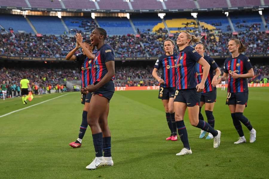 Barcelona's Nigerian forward Asisat Oshoala celebrates scoring her team's third goal