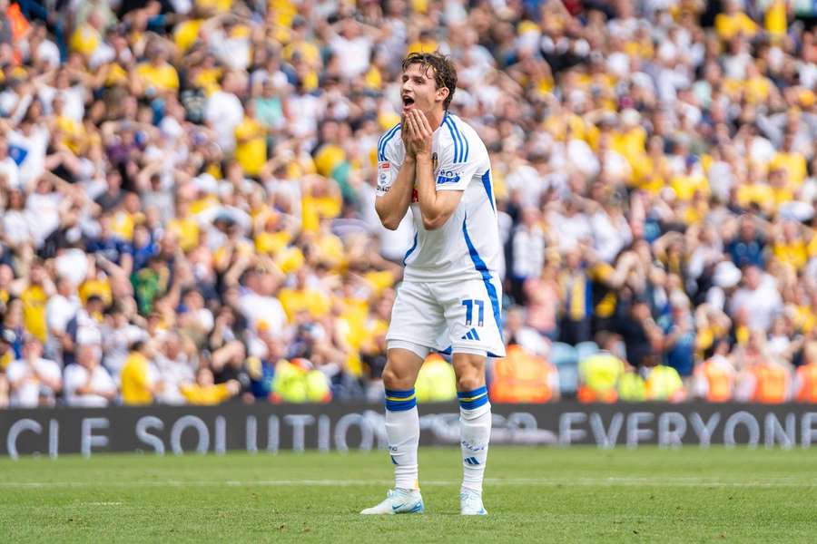 Leeds' Brendan Aaronson reacts to his late miss