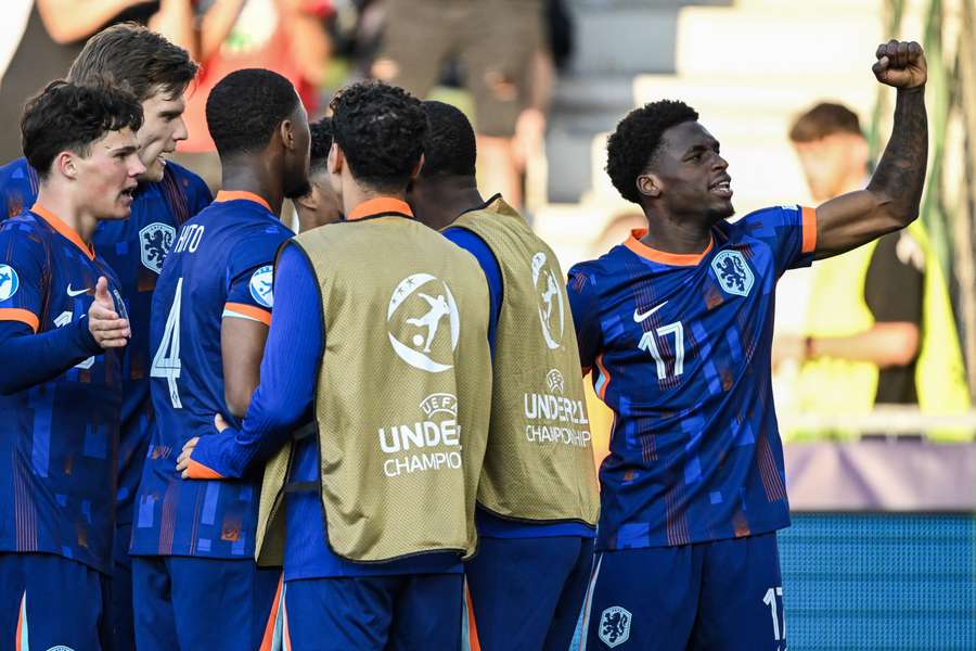 The Netherlands celebrate Ernest Poku's (R) late 1-0