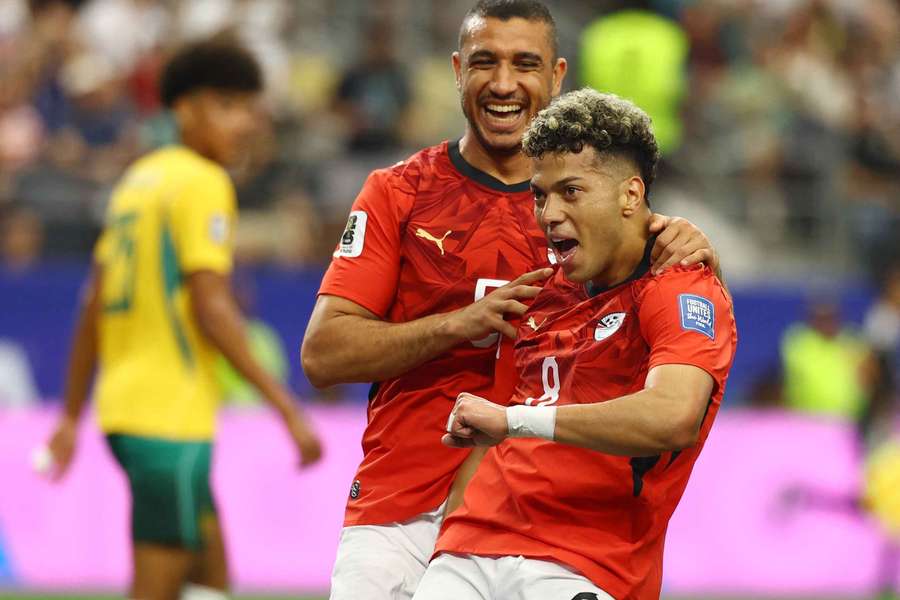 Egypt's Emam Ashour celebrates scoring their first goal with Ramy Rabia Egypt's Emam Ashour celebrates scoring their first goal with Ramy Rabia