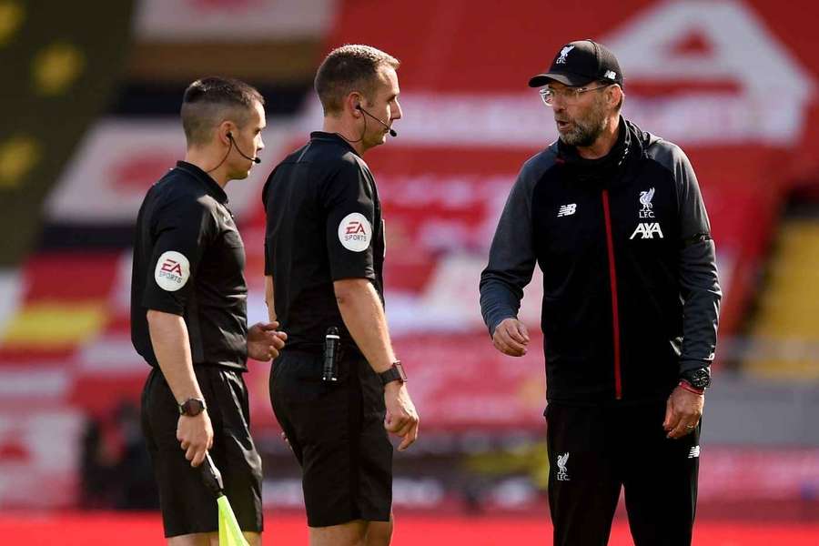 David Coote, junto a Jürgen Klopp.