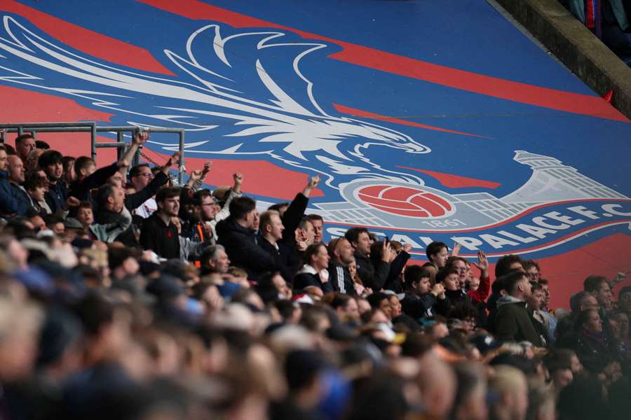General view of a giant Crystal Palace banner and fans during a match General view of a giant Crystal Palace banner and fans during a match