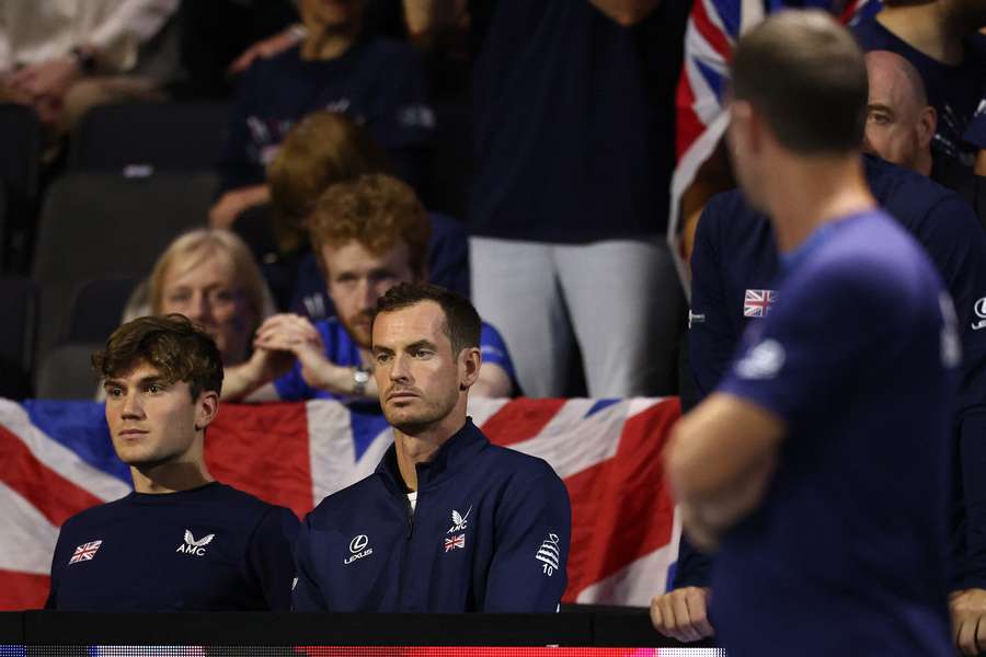 Murray (C) watches on at the Davis Cup