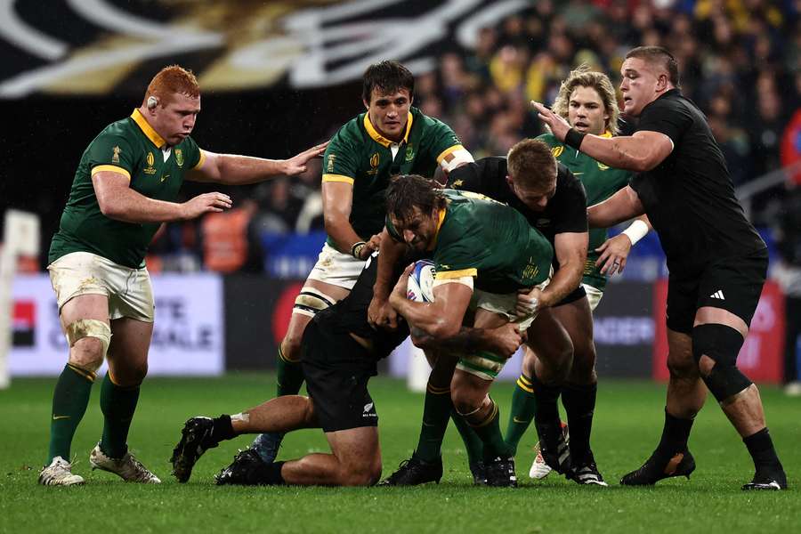 South Africa lock Eben Etzebeth is tackled during the World Cup final against New Zealand