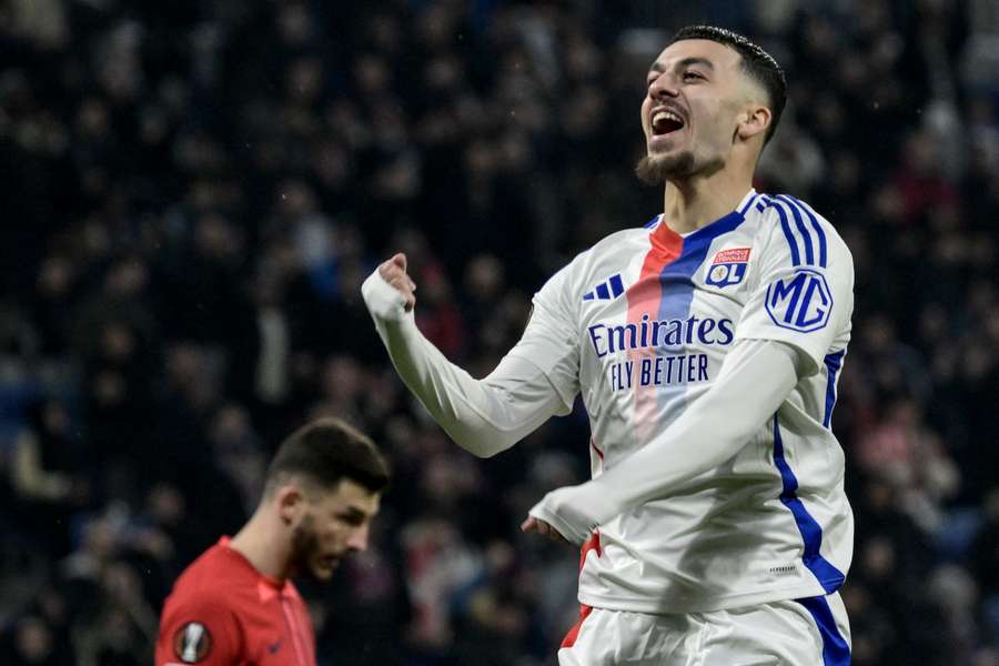 Lyon's Georges Mikautadze celebrates scoring his team's third goal against FCSB