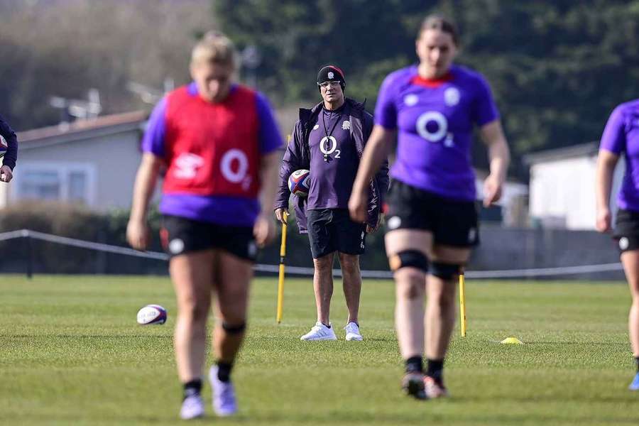 England women's coach John Mitchell watches on during training
