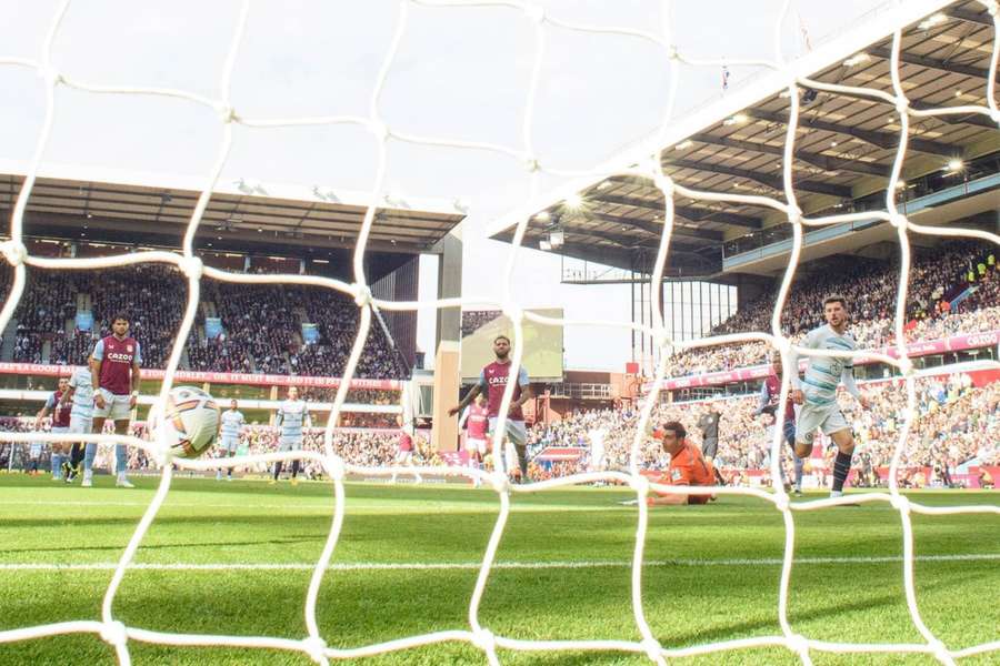 Mason Mount puts Chelsea 1-0 up after an error from Aston Villa defender Tyrone Mings.