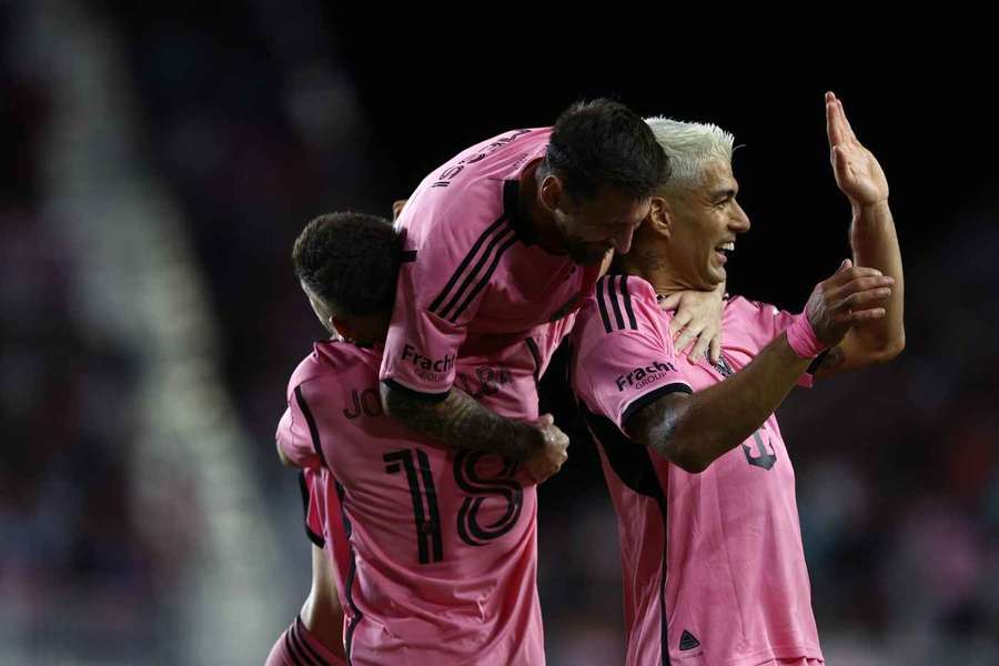 Alba, Messi and Suarez celebrate