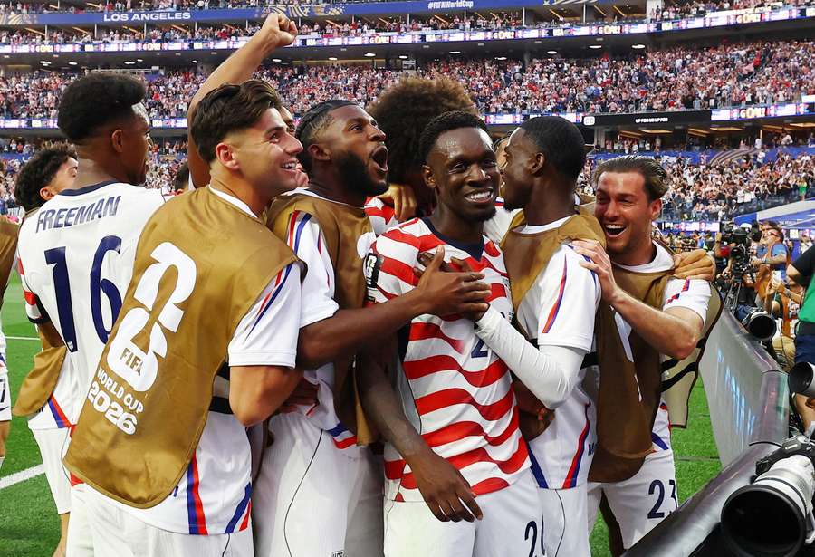 Folarin Balogun surrounded by his teammates after scoring Folarin Balogun surrounded by his teammates after scoring