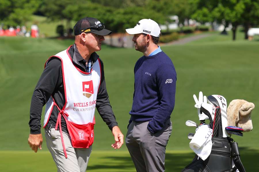 Patrick Cantlay and caddie Joe LaCava take part in a practice round ahead of the Wells Fargo Championship