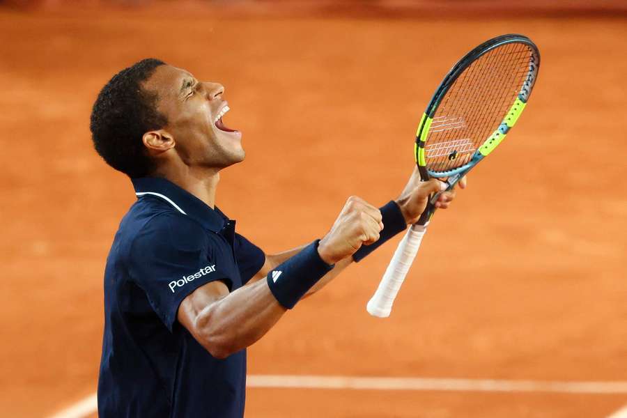 Auger-Aliassime celebrates his win