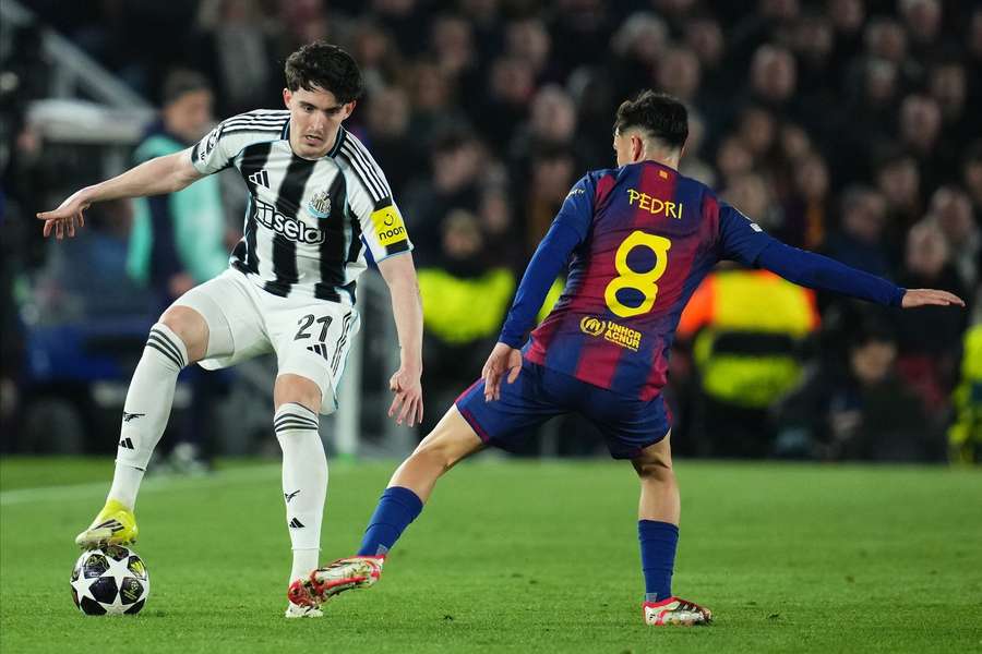 Newcastle's Tino Livramento (left) during the game against Barcelona