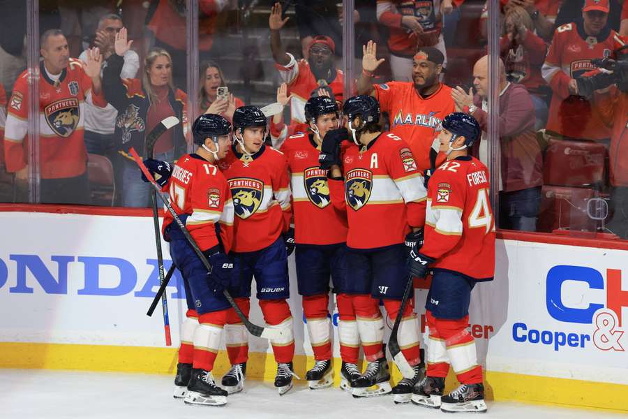 The Florida Panthers celebrate one of their goals during their opening night win.