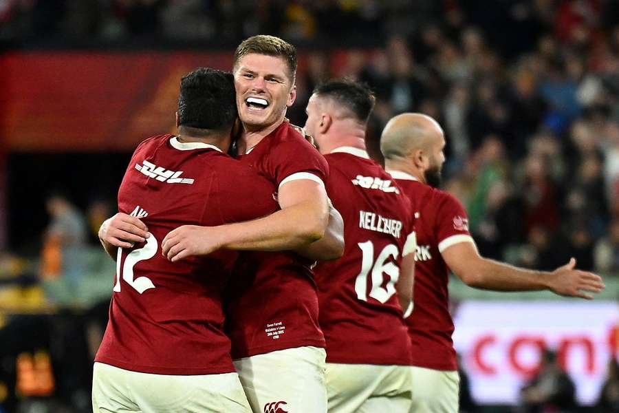 British and Irish lions Owen Farrell celebrates teammates after a match British and Irish lions Owen Farrell celebrates teammates after a match