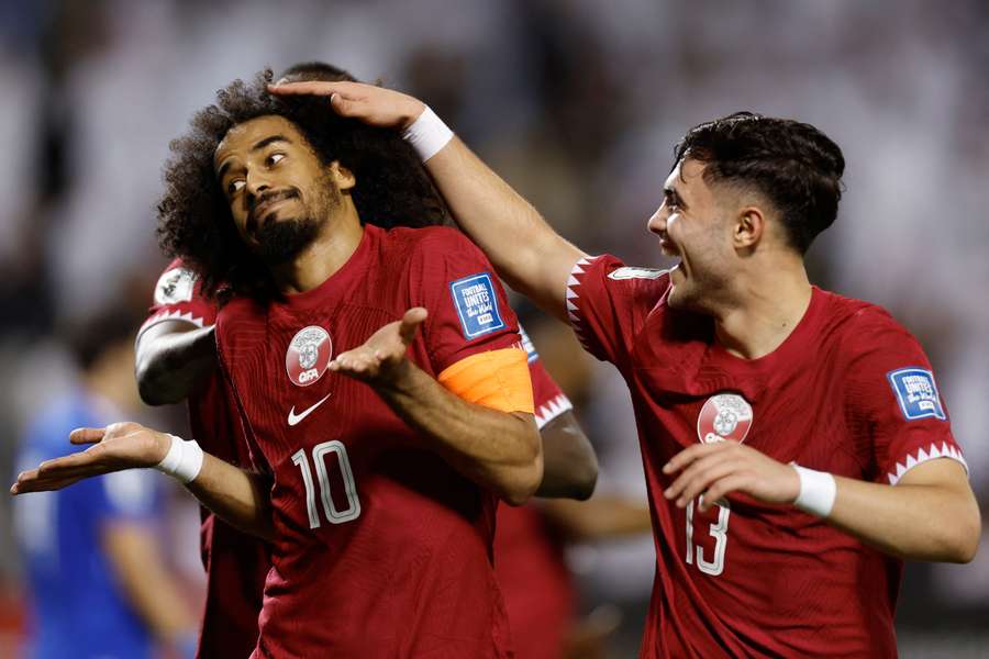 Afif comemora o terceiro golo do Catar