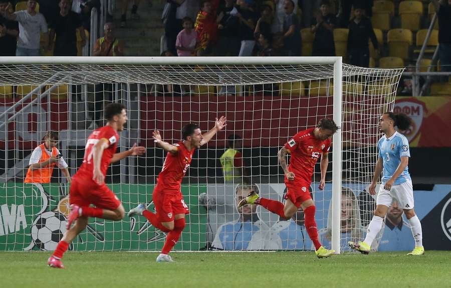 North Macedonia players celebrate after Ezgjan Alioski scores their first goal North Macedonia players celebrate after Ezgjan Alioski scores their first goal