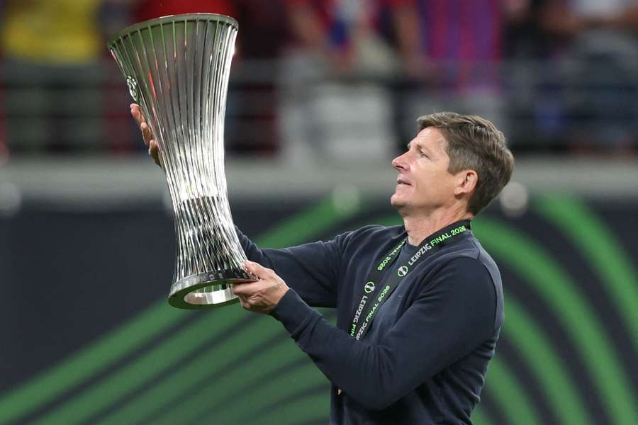 Crystal Palace coach Oliver Glasner lifts the UEFA Conference League trophy