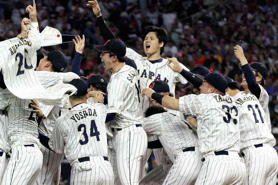 Shohei Ohtani and his teammates celebrate winning the World Baseball Classic for Japan in 2023