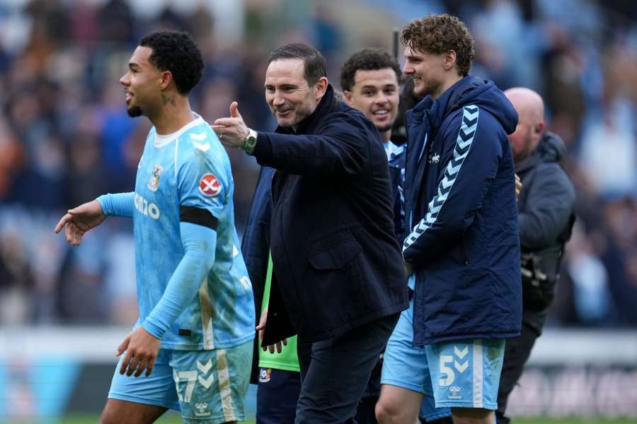 Frank Lampard and Milan van Ewijk of Coventry City celebrate at full-time
