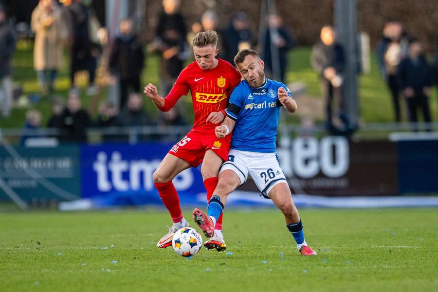 FC Nordsjaelland's Noah Markmann and Lyngby's Frederik Gytkjaer battle for the ball