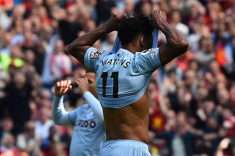 Aston Villa's English striker Ollie Watkins (R) reacts after reacts after failing to score from the penalty spot