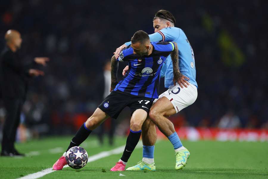 Inter Milan's Marcelo Brozovic in action with Manchester City's Jack Grealish during the Champions League final