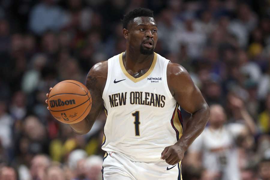 Zion Williamson taking the ball up the court against the Denver Nuggets