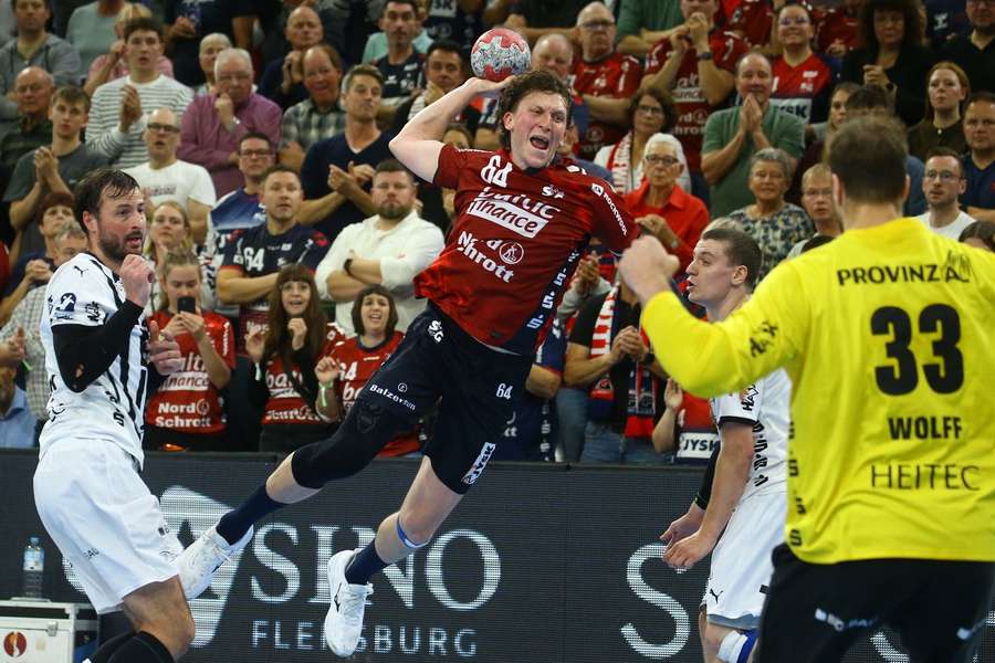 Lasse Moller scores one of his ten goals in the match