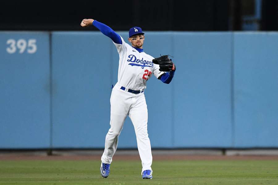 Dodgers centre fielder Trayce Thompson fields a ball