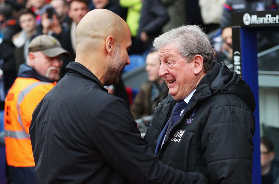 Pep Guardiola of Manchester City and Roy Hodgson of Crystal Palace in discussion prior to the Premier League match between Crystal Palace and Manchester City at Selhurst Park on December 31st, 2017
