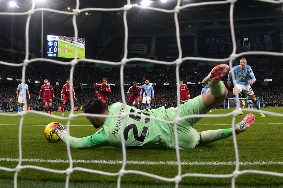 Liverpool's Giorgi Mamardashvili saves Erling Haaland's penalty