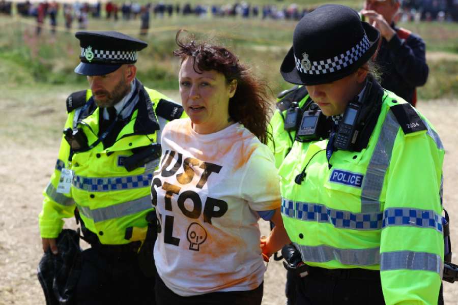 Security removing a Just Stop Oil protestor