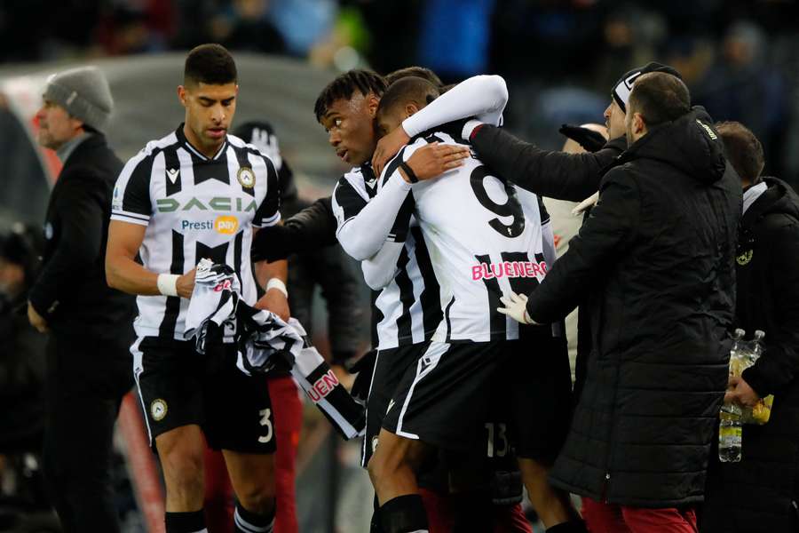 Beto receives the plaudits of his teammates after netting in the first half