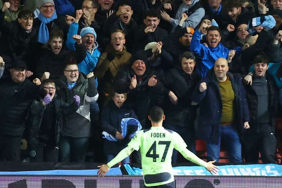 Phil Foden celebrates with the fans