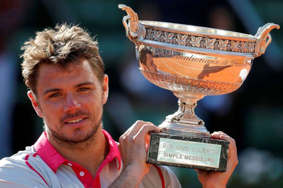 Stan Wawrinka poses with his trophy after winning the 2015 French Open Stan Wawrinka poses with his trophy after winning the 2015 French Open