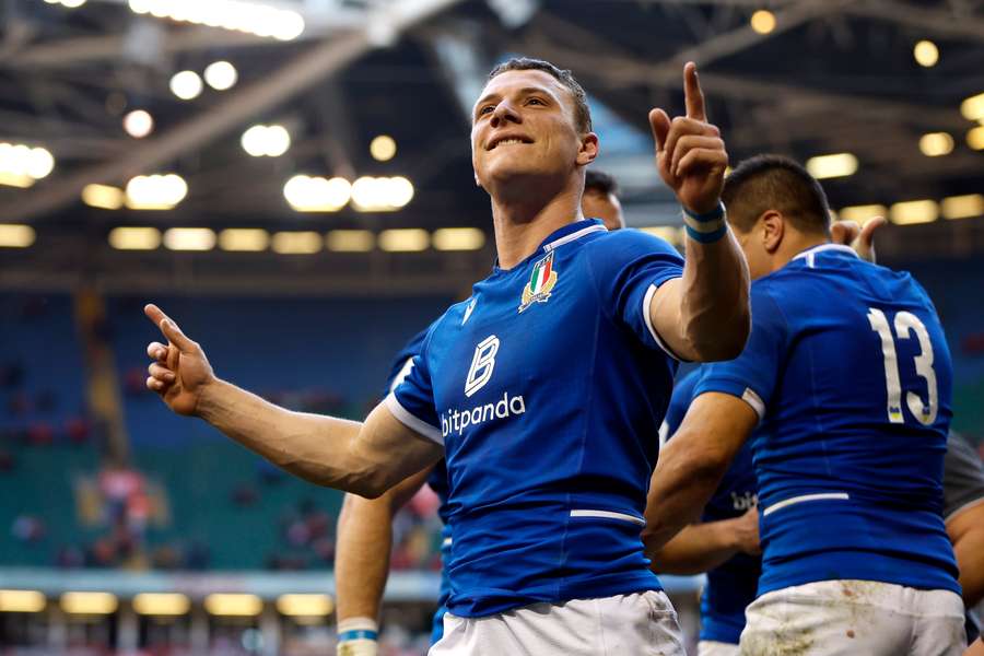 Italy's Paolo Garbisi celebrates with teammates