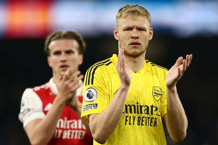 Aaron Ramsdale and Rob Holding applaud supporters after their defeat at Man City