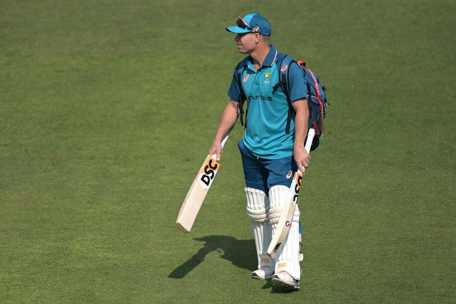 Batting concern: Australia's David Warner arrives for a practice session at the Arun Jaitley Stadium in New Delhi