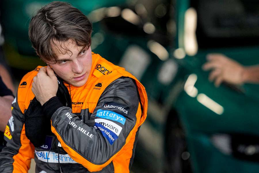 McLaren's Australian driver Oscar Piastri reacts after finishing first in the sprint shootout