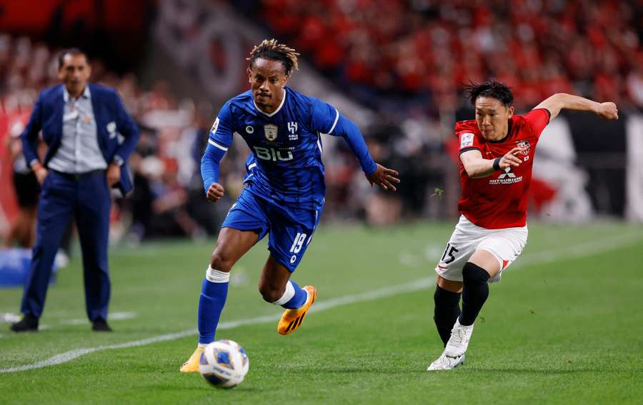 Al Hilal's Andre Carrillo in action with Urawa Red Diamonds' Takahiro Akimoto